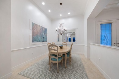 Low-maintenance, country club home with a private setting! Over on Boca Royale Golf and Country Club in Florida - for sale on GolfHomes.com, golf home, golf lot