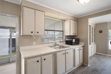 Welcome to this charming and refreshed 2-bedroom, 2-bathroom on Brookridge Country Club in Florida - for sale on GolfHomes.com, golf home, golf lot