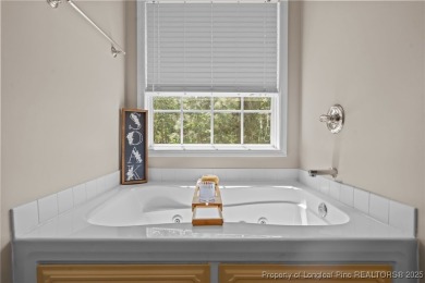 Charming Brick Ranch in Coveted Carolina Lakes - Exceptional on Carolina Lakes Country Club in North Carolina - for sale on GolfHomes.com, golf home, golf lot