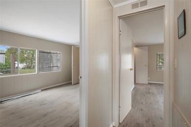 Welcome to this charming and refreshed 2-bedroom, 2-bathroom on Brookridge Country Club in Florida - for sale on GolfHomes.com, golf home, golf lot