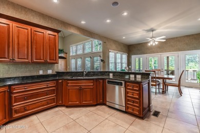 Discover luxury living in this exquisite 4-bedroom, 3-bath home on Ocean Ridge Plantation in North Carolina - for sale on GolfHomes.com, golf home, golf lot