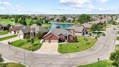 Serene setting with picturesque views of the lake and golf on Sierra Hills Golf Club in Kansas - for sale on GolfHomes.com, golf home, golf lot