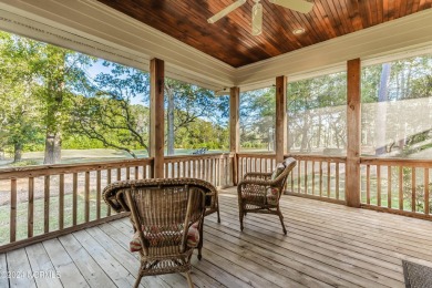 Discover luxury living in this exquisite 4-bedroom, 3-bath home on Ocean Ridge Plantation in North Carolina - for sale on GolfHomes.com, golf home, golf lot