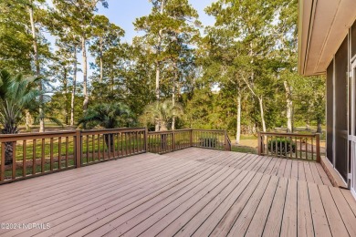 Discover luxury living in this exquisite 4-bedroom, 3-bath home on Ocean Ridge Plantation in North Carolina - for sale on GolfHomes.com, golf home, golf lot