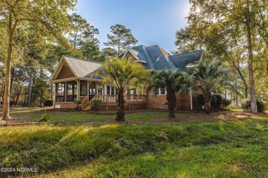 Discover luxury living in this exquisite 4-bedroom, 3-bath home on Ocean Ridge Plantation in North Carolina - for sale on GolfHomes.com, golf home, golf lot