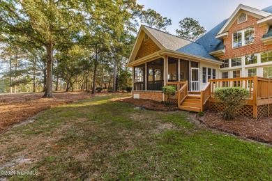 Discover luxury living in this exquisite 4-bedroom, 3-bath home on Ocean Ridge Plantation in North Carolina - for sale on GolfHomes.com, golf home, golf lot