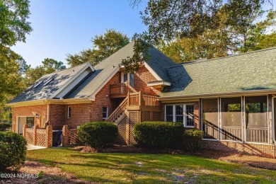 Discover luxury living in this exquisite 4-bedroom, 3-bath home on Ocean Ridge Plantation in North Carolina - for sale on GolfHomes.com, golf home, golf lot