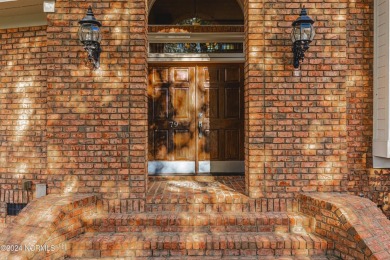 Discover luxury living in this exquisite 4-bedroom, 3-bath home on Ocean Ridge Plantation in North Carolina - for sale on GolfHomes.com, golf home, golf lot