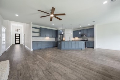 Welcome to this Cavendish custom home located in the on Heath Golf and Yacht Club in Texas - for sale on GolfHomes.com, golf home, golf lot