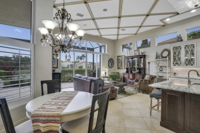 This beautiful 3-bedroom, plus office, 2.5-bathroom lakefront on Banyan Golf Club in Florida - for sale on GolfHomes.com, golf home, golf lot