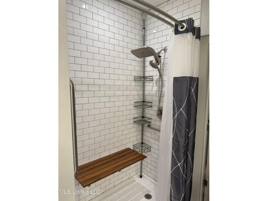 Discover the perfect blend of comfort, convenience, and coastal on Gulf Hills Golf Club in Mississippi - for sale on GolfHomes.com, golf home, golf lot