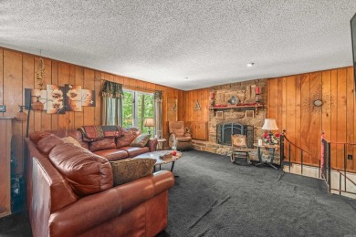 Nestled in a peaceful, wooded setting of Diamondhead Golf & on Diamondhead Golf and Country Club in Arkansas - for sale on GolfHomes.com, golf home, golf lot