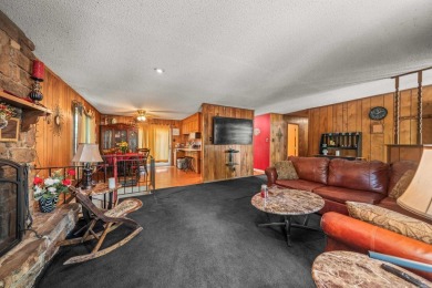 Nestled in a peaceful, wooded setting of Diamondhead Golf & on Diamondhead Golf and Country Club in Arkansas - for sale on GolfHomes.com, golf home, golf lot
