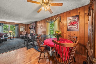 Nestled in a peaceful, wooded setting of Diamondhead Golf & on Diamondhead Golf and Country Club in Arkansas - for sale on GolfHomes.com, golf home, golf lot