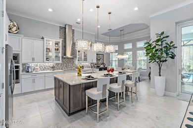 Experience luxury living at its finest in this exceptional 2023 on Plantation Bay Golf and Country Club in Florida - for sale on GolfHomes.com, golf home, golf lot