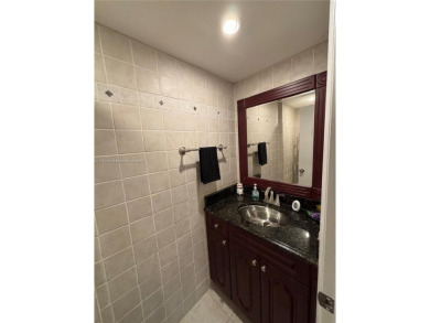 UPDATED 3rd Floor 1 bedroom/1.5 bath condo in International on Inverrary Country Club in Florida - for sale on GolfHomes.com, golf home, golf lot