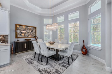 Experience luxury living at its finest in this exceptional 2023 on Plantation Bay Golf and Country Club in Florida - for sale on GolfHomes.com, golf home, golf lot