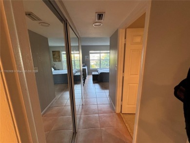 UPDATED 3rd Floor 1 bedroom/1.5 bath condo in International on Inverrary Country Club in Florida - for sale on GolfHomes.com, golf home, golf lot