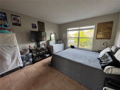UPDATED 3rd Floor 1 bedroom/1.5 bath condo in International on Inverrary Country Club in Florida - for sale on GolfHomes.com, golf home, golf lot