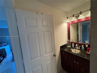 UPDATED 3rd Floor 1 bedroom/1.5 bath condo in International on Inverrary Country Club in Florida - for sale on GolfHomes.com, golf home, golf lot