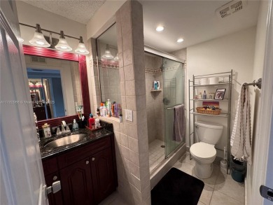 UPDATED 3rd Floor 1 bedroom/1.5 bath condo in International on Inverrary Country Club in Florida - for sale on GolfHomes.com, golf home, golf lot