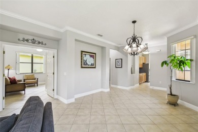 Stunning 2-bedroom, 2-bath plus DEN Hemingway model with on Poinciana Golf Club in Florida - for sale on GolfHomes.com, golf home, golf lot