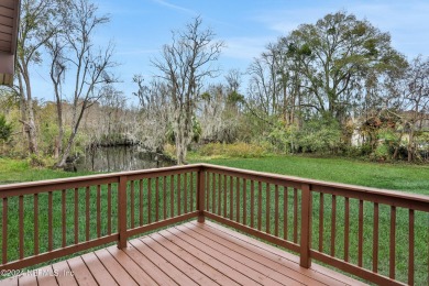 This navigable, waterfront property sits on a double lot on Hyde Park Golf Club in Florida - for sale on GolfHomes.com, golf home, golf lot