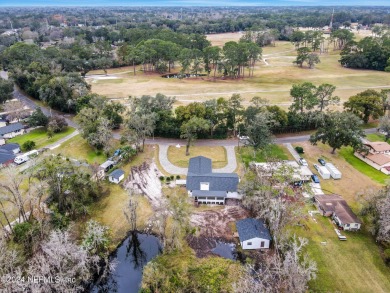 This navigable, waterfront property sits on a double lot on Hyde Park Golf Club in Florida - for sale on GolfHomes.com, golf home, golf lot