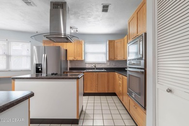 LOCATION, LOCATION, LOCATION! This charming home is situated in on Plantation Bay Golf and Country Club in Florida - for sale on GolfHomes.com, golf home, golf lot