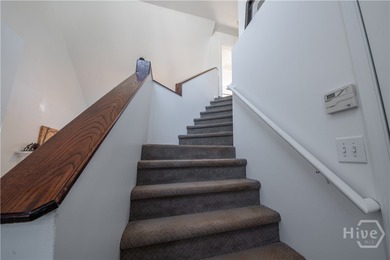 Charming and low-maintenance, this all-brick two-story home is on Jennings Mill Country Club in Georgia - for sale on GolfHomes.com, golf home, golf lot