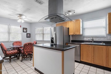 LOCATION, LOCATION, LOCATION! This charming home is situated in on Plantation Bay Golf and Country Club in Florida - for sale on GolfHomes.com, golf home, golf lot