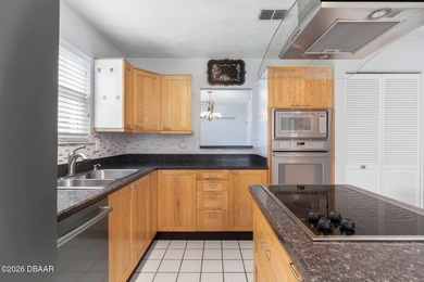 LOCATION, LOCATION, LOCATION! This charming home is situated in on Plantation Bay Golf and Country Club in Florida - for sale on GolfHomes.com, golf home, golf lot