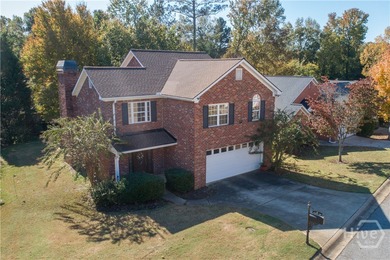 Charming and low-maintenance, this all-brick two-story home is on Jennings Mill Country Club in Georgia - for sale on GolfHomes.com, golf home, golf lot