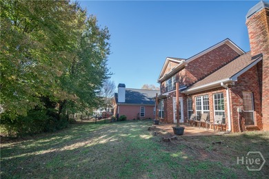 Charming and low-maintenance, this all-brick two-story home is on Jennings Mill Country Club in Georgia - for sale on GolfHomes.com, golf home, golf lot