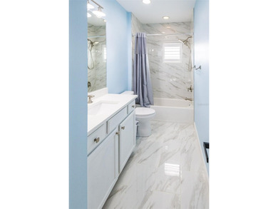 Better than brand new, this beautifully remodeled ( 2021) on Ritz-Carlton Members Golf Club in Florida - for sale on GolfHomes.com, golf home, golf lot