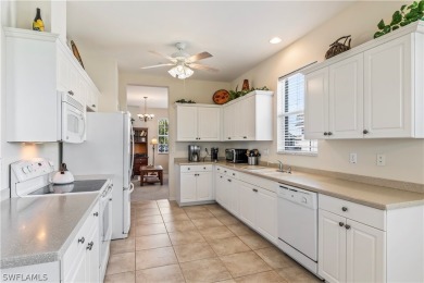PRICE REDUCTION! LOOKING FOR A SPACIOUS CONDO WITH A GARAGE? YOU on River Hall Country Club in Florida - for sale on GolfHomes.com, golf home, golf lot