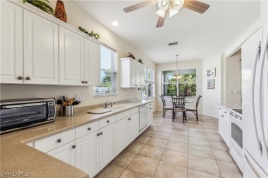 PRICE REDUCTION! LOOKING FOR A SPACIOUS CONDO WITH A GARAGE? YOU on River Hall Country Club in Florida - for sale on GolfHomes.com, golf home, golf lot