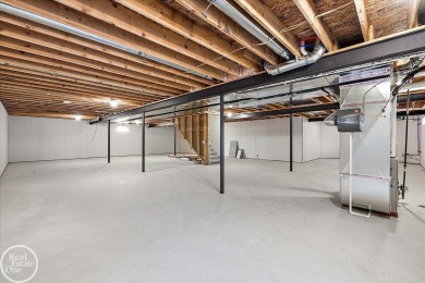 Quality luxury ranch featuring a modern and stylish design built on Copper Hills Golf and Country Club in Michigan - for sale on GolfHomes.com, golf home, golf lot