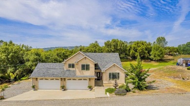 Located on a corner lot overlooking the 8th fairway of the on Yosemite Lakes Park Golf Course in California - for sale on GolfHomes.com, golf home, golf lot