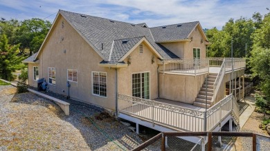 Located on a corner lot overlooking the 8th fairway of the on Yosemite Lakes Park Golf Course in California - for sale on GolfHomes.com, golf home, golf lot