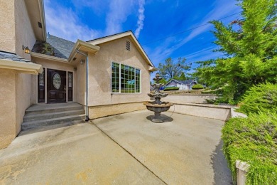 Located on a corner lot overlooking the 8th fairway of the on Yosemite Lakes Park Golf Course in California - for sale on GolfHomes.com, golf home, golf lot