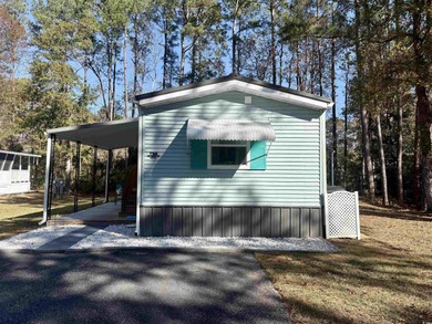 Welcome home to this beautifully updated 2-bedroom, 2-bath on Indigo Creek Golf Club in South Carolina - for sale on GolfHomes.com, golf home, golf lot