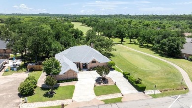 Gorgeous - fantastic drive up appeal and outstanding fairway on Pecan Plantation Country Club in Texas - for sale on GolfHomes.com, golf home, golf lot