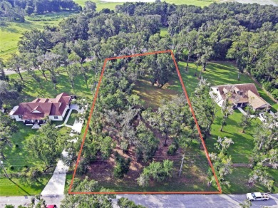 Build your private estate on 1.2 acres in the rolling hills of on Lake Jovita Golf and Country Club in Florida - for sale on GolfHomes.com, golf home, golf lot