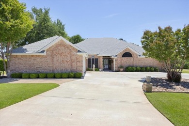Gorgeous - fantastic drive up appeal and outstanding fairway on Pecan Plantation Country Club in Texas - for sale on GolfHomes.com, golf home, golf lot