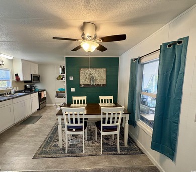 Welcome home to this beautifully updated 2-bedroom, 2-bath on Indigo Creek Golf Club in South Carolina - for sale on GolfHomes.com, golf home, golf lot