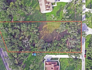Build your private estate on 1.2 acres in the rolling hills of on Lake Jovita Golf and Country Club in Florida - for sale on GolfHomes.com, golf home, golf lot