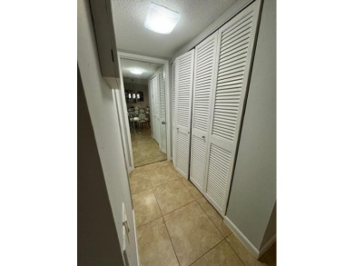 THIS IS A RARE FIRST FLOOR CORNER CONDO AND IT IS IN EXCELLENT on Wynmoor Golf Course in Florida - for sale on GolfHomes.com, golf home, golf lot