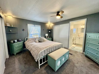 Welcome home to this beautifully updated 2-bedroom, 2-bath on Indigo Creek Golf Club in South Carolina - for sale on GolfHomes.com, golf home, golf lot