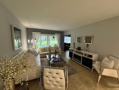 THIS IS A RARE FIRST FLOOR CORNER CONDO AND IT IS IN EXCELLENT on Wynmoor Golf Course in Florida - for sale on GolfHomes.com, golf home, golf lot